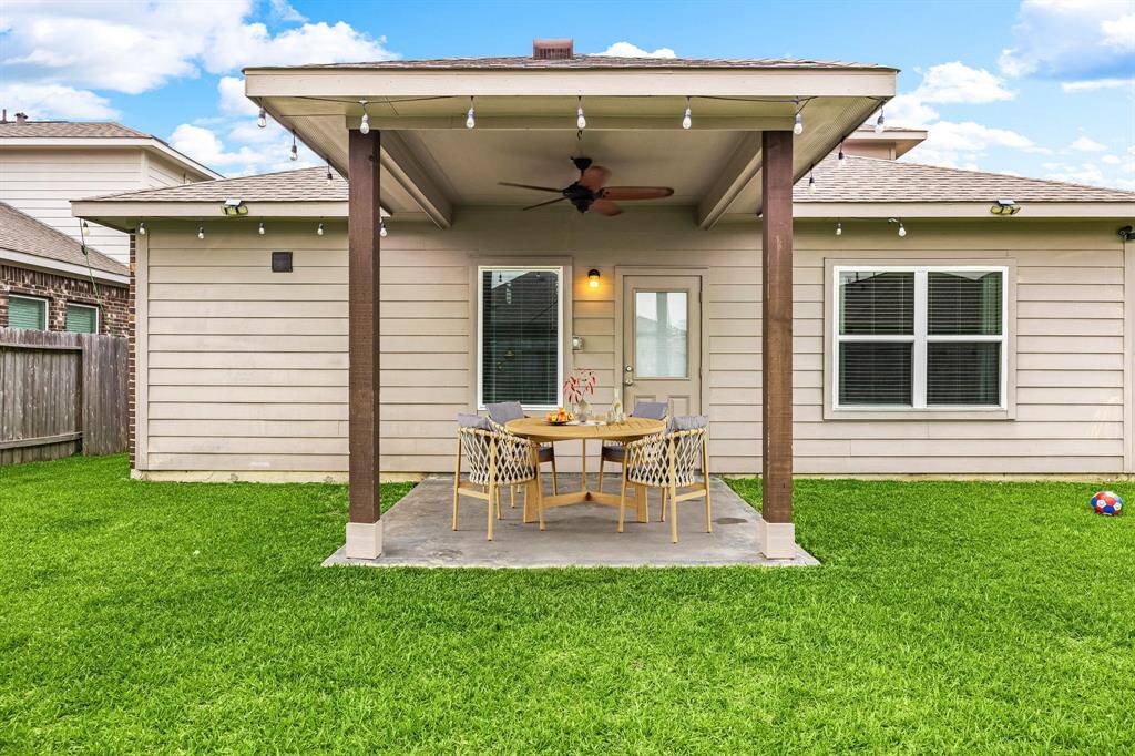 Come and see this spacious backyard with its beautiful covered patio and paved walkway down the side yard. There is plenty of room for the kids to play and adults to relax! Perfect for your outdoor living space, patio furniture, bbq pit, and so much more. The possibilities are endless!