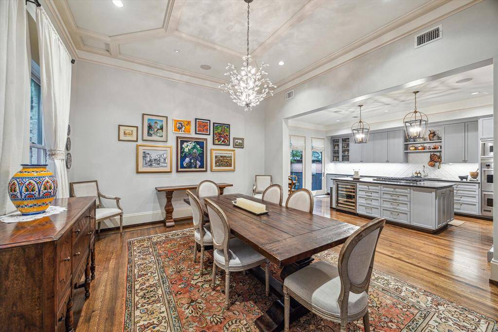 The dining room opens into a stunning chef’s kitchen, creating ideal flow for entertaining and everyday living.