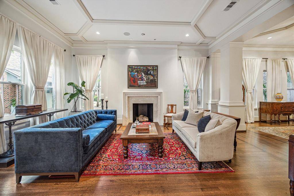 This expertly designed home offers first-floor living with elegant formal spaces.