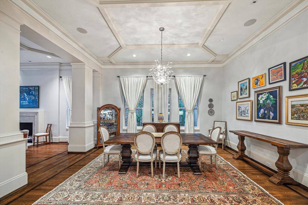 Host unforgettable dinners beneath a striking chandelier in this spacious dining room.