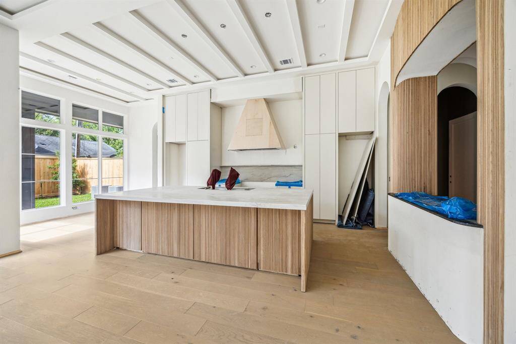 View towards the Island Kitchen and Breakfast Area to the left.  There is a premium appliance package.