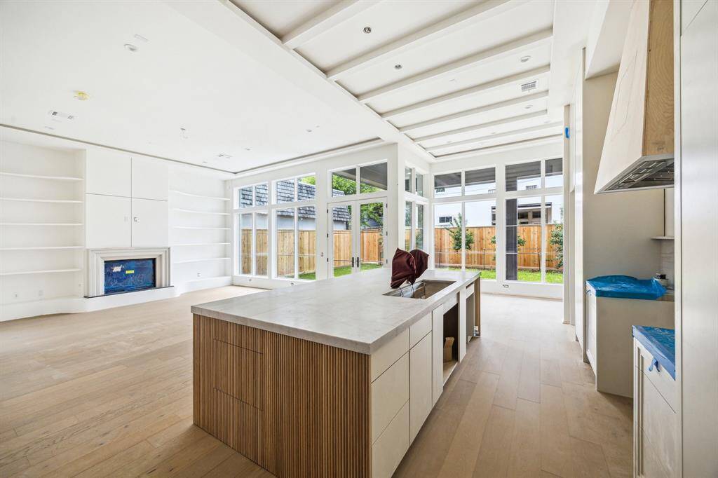 Another view from the Kitchen towards the Family Room and the Back Yard.