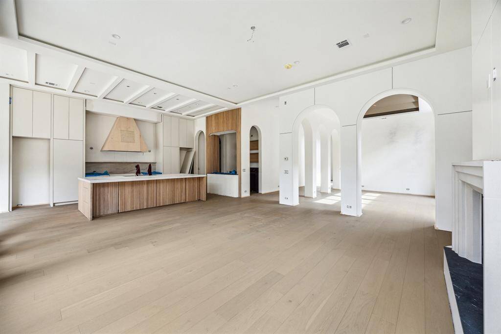 Great open floor plan.  This is a view from the Family Room towards the Island Kitchen, Bar and Dining Room.