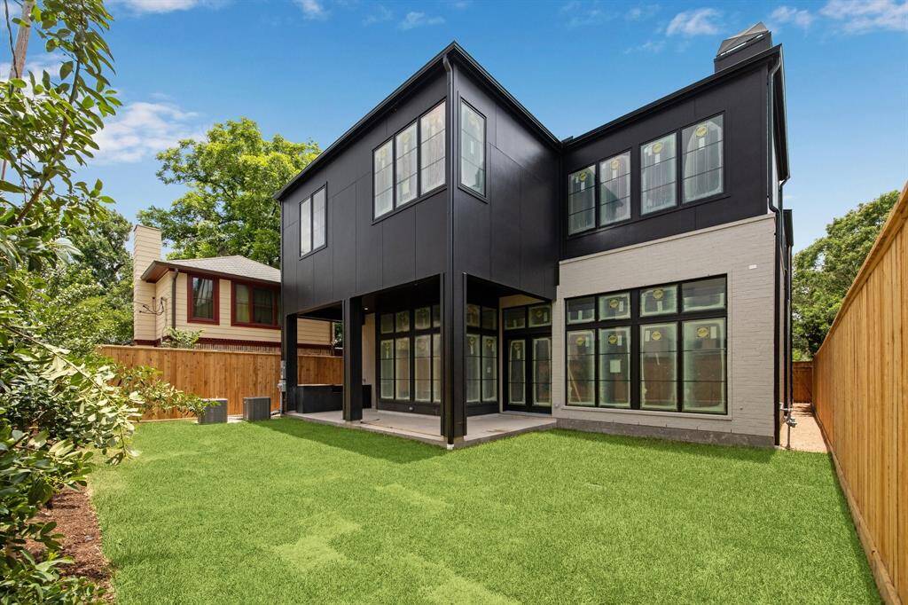 Back elevation of the home with room for a pool.