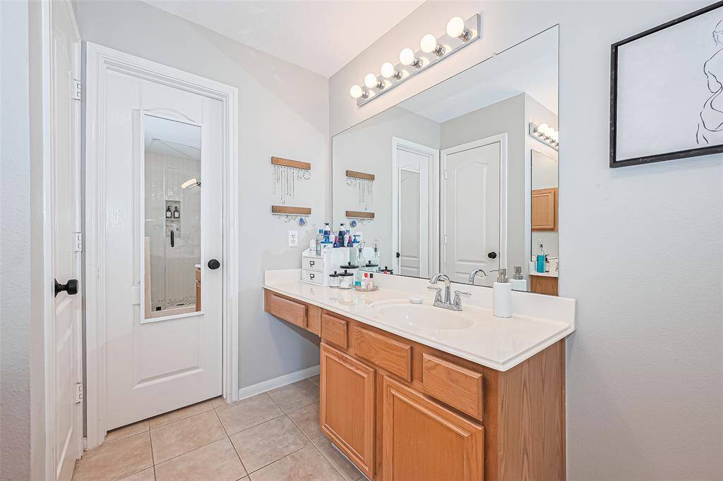 One of the sinks in the primary bathroom, complete with a built-in vanity area.One of the sinks in the primary bathroom, complete with a built-in vanity area.