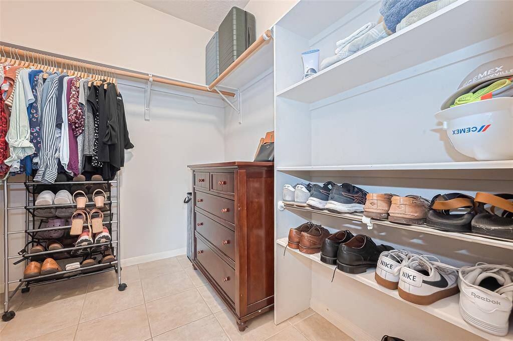 Large primary closet connects to the bathroom.