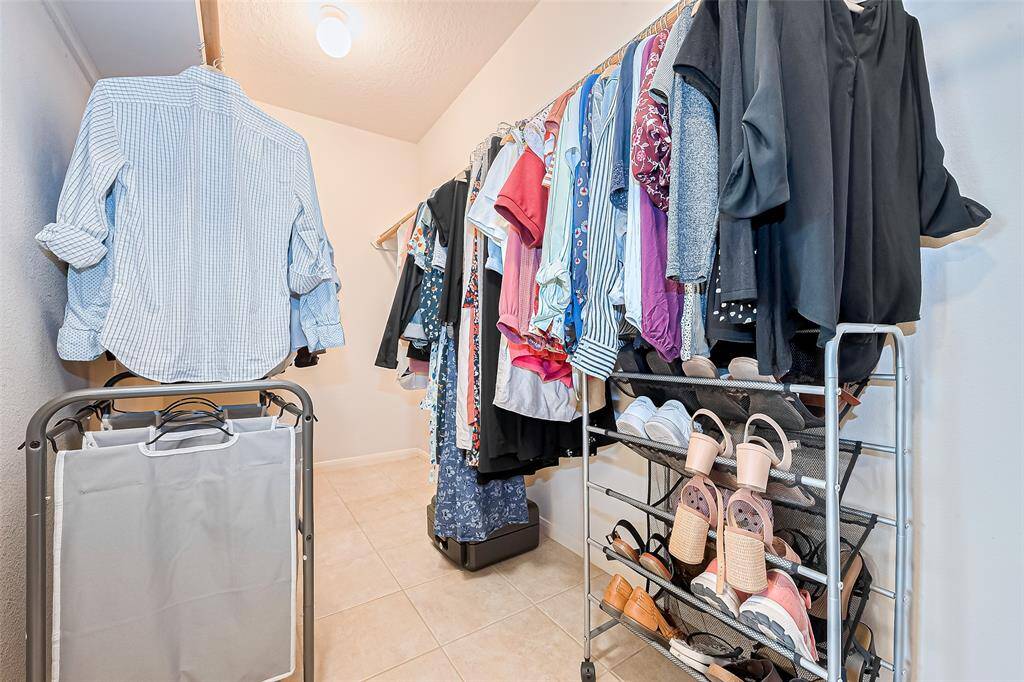 Primary closet as plenty of space for extra store.