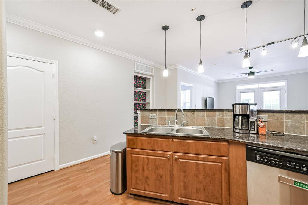 Easy care laminate floors in the main living spaces.