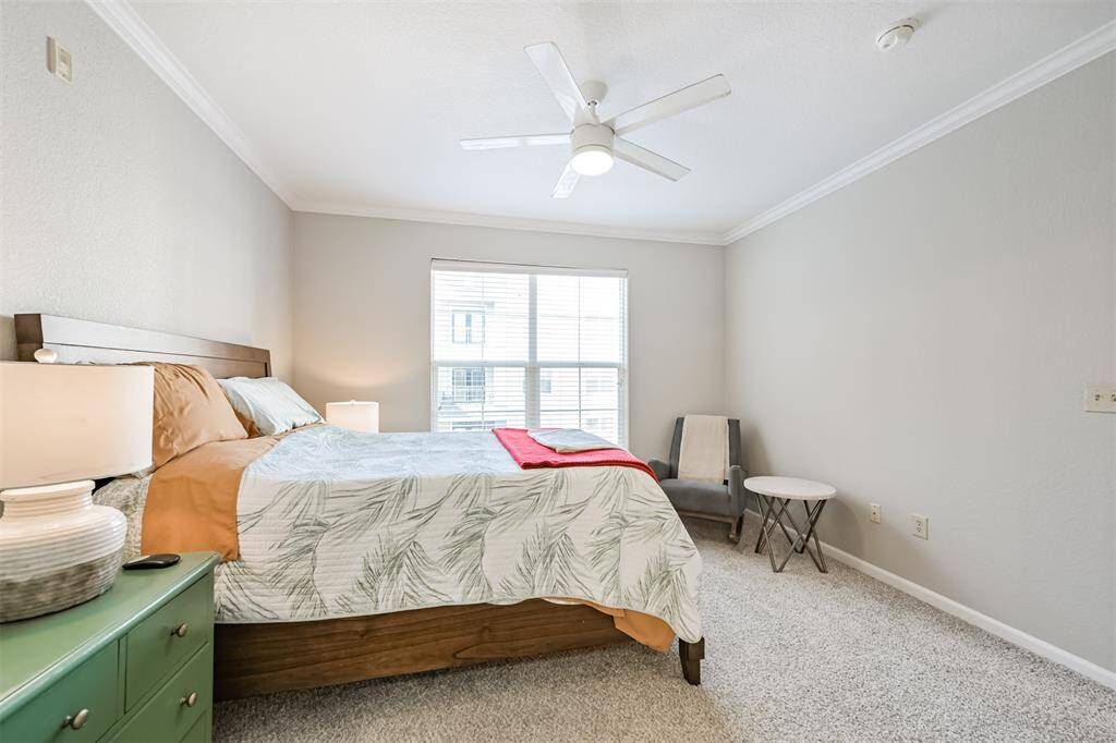 The bedroom is spacious and will easily accommodate a king sized bed.