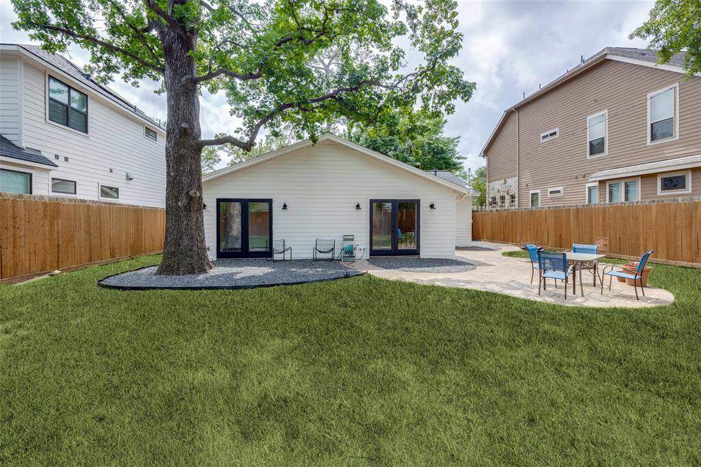 The kids and dogs will love this shaded backyard. Hours of fun with family and friends await you here. There is still room for a pool in the huge backyard.