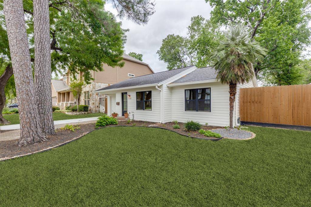 This original 1949 renovated Cottage sits on a spacious 7,200 sq ft lot with mature landscape in the shadows of towering trees.