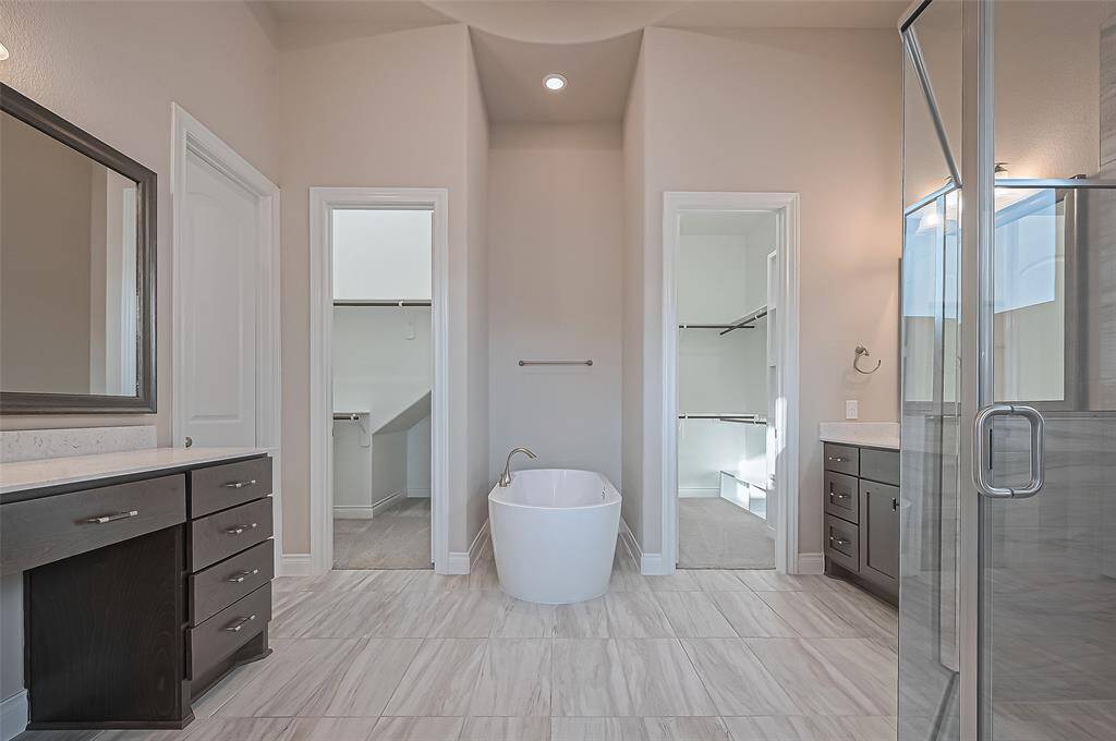 Dual sinks one with additional vanity space