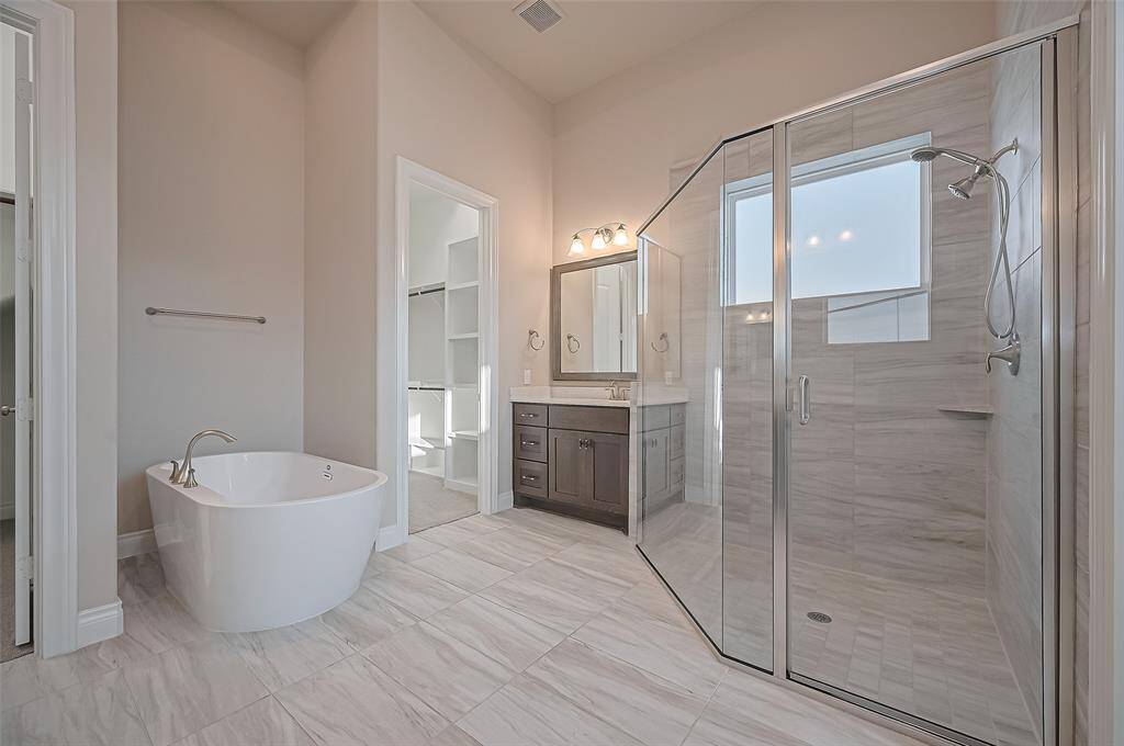 Soaking tub with separate shower