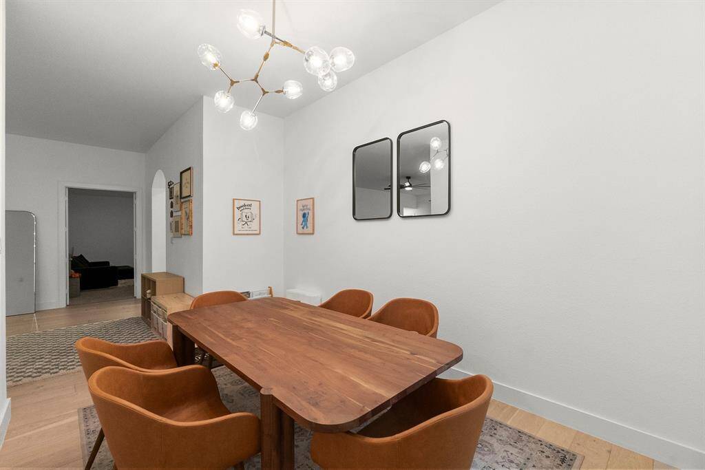Dine in elegance in this stunning Formal Dining Room. With plenty of space for a large dining table and additional  furniture pieces, this room is perfect for any special occasion. Whether hosting a dinner party or enjoying a quiet meal, this space adds a touch of luxury to every occasion.