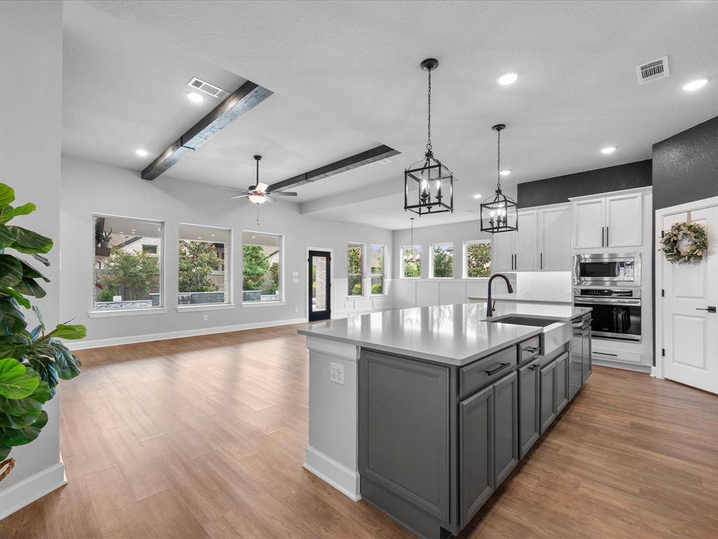 Welcome Home to 17511 Autumn Leaves Drive, a luxury David Weekley Home with various additional updates beyond builder-grade that checks all of the boxes!  The list of bells & whistles on this home brings much convenience for its new homeowner.