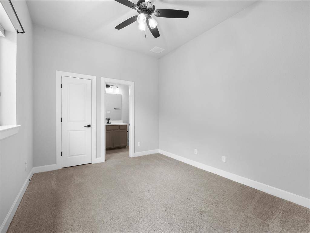 Tucked away on the other side of the home is this En-Suite with Bathroom!  Walk-In Closet as well.