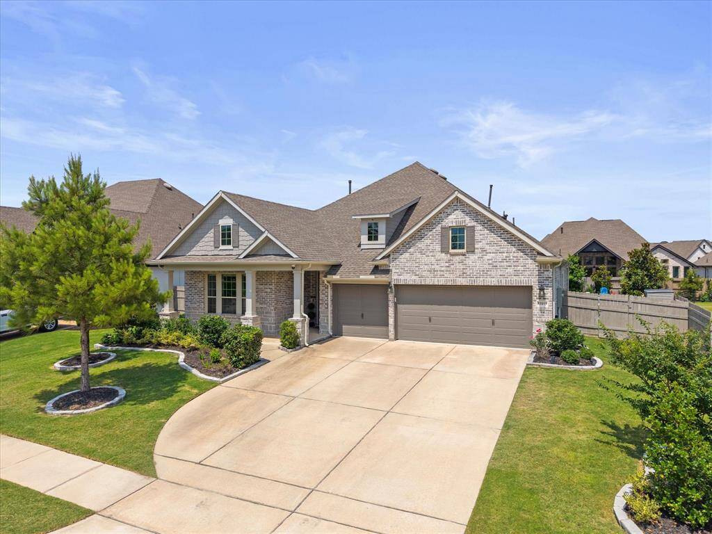 Featuring extended driveway and it's 3 car garage with epoxy flooring is such a convenience!