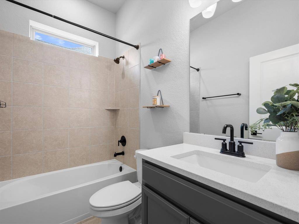 3rd Full Bath between 3rd & 4th Guest Bedrooms
