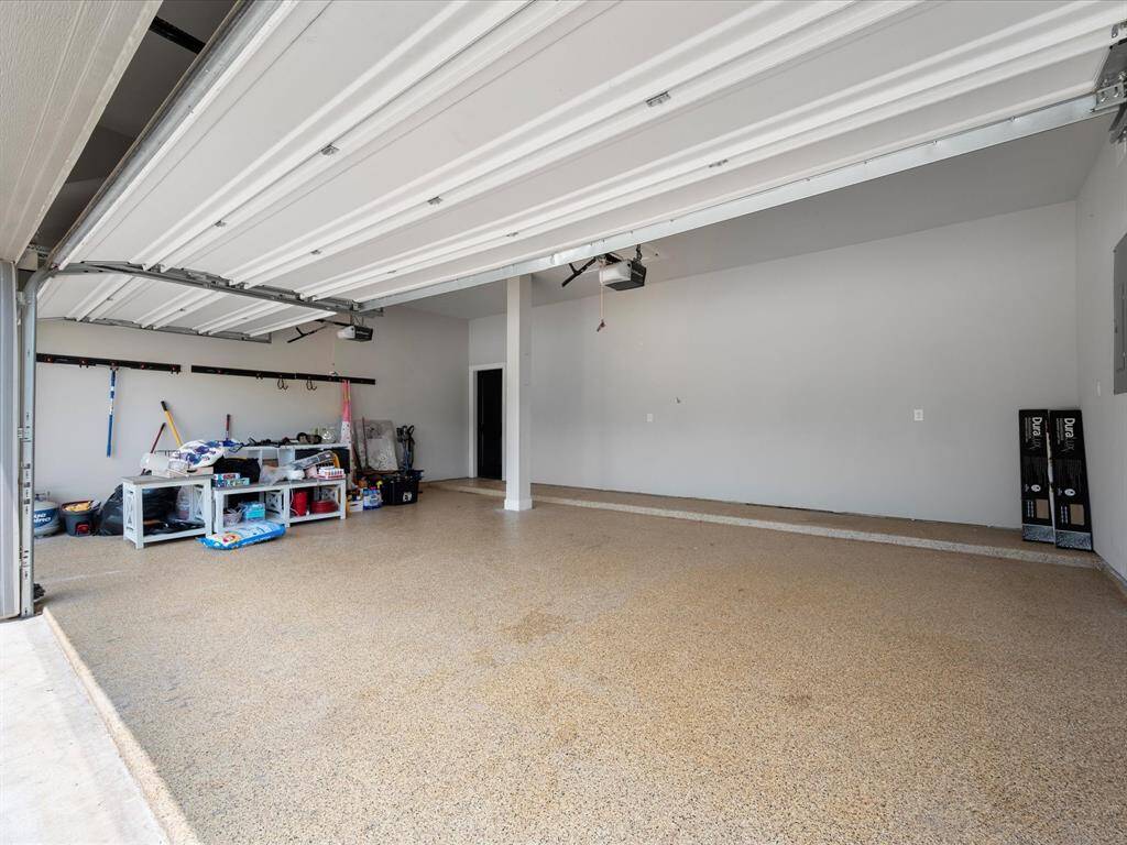 3 Car Garages are a top hit perfect for the golf cart, sports car and it's been professionally epoxied too!