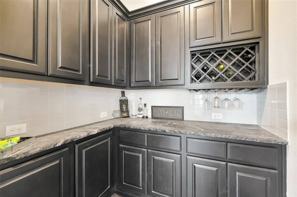 Built-in wine rack adds a touch of sophistication and keeps your favorite vintages stylishly within reach.
