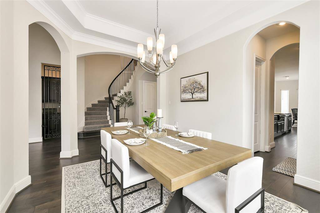 Another look at the dining area reveals refined details and architectural charm that elevate every gathering.