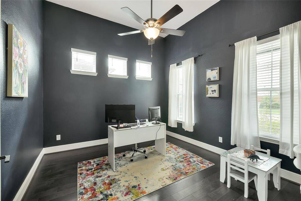 Office/Study with plenty of natural light and ceiling fan.