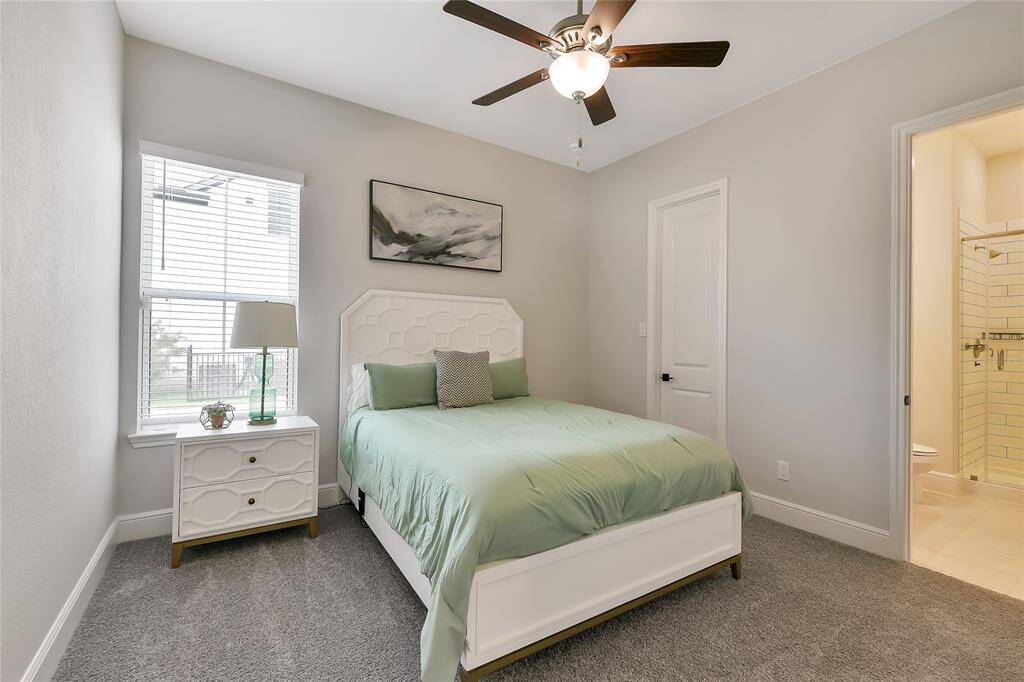 Downstairs bedroom with en suite bath.