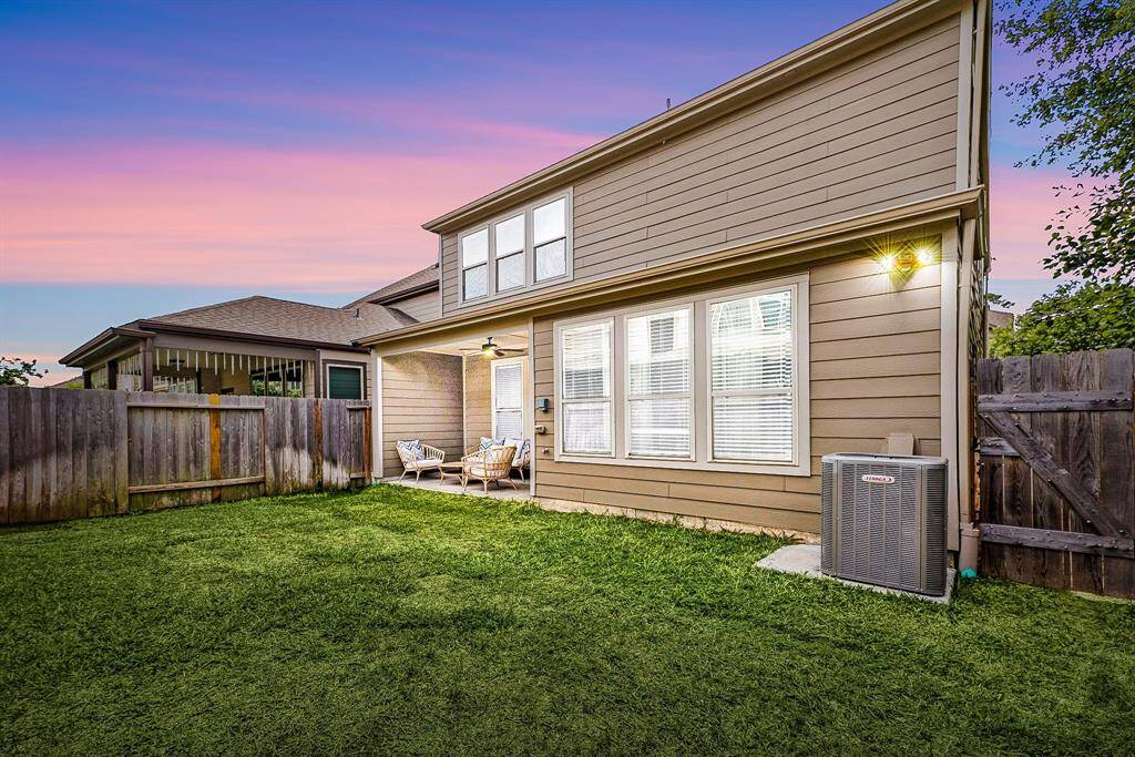 A sprawling lawn create the perfect setting for summer cookouts, lawn games, and starlit relaxation.