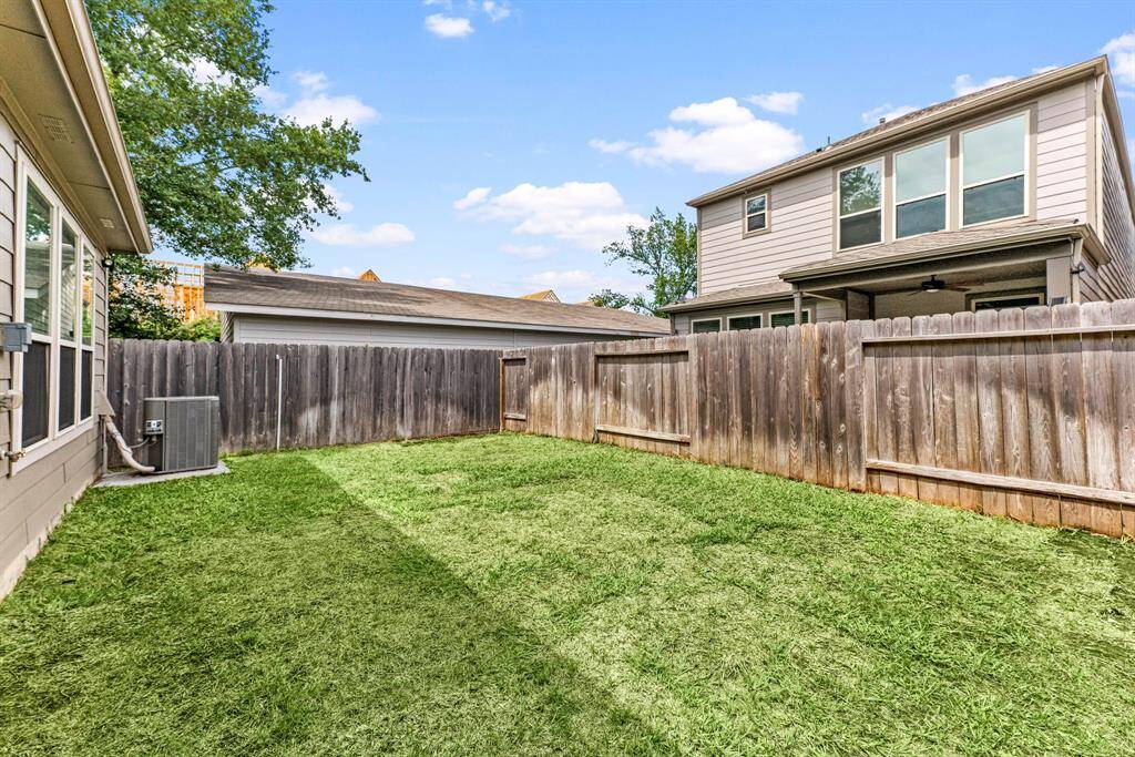 Whether it’s a future pool, swing set, or weekend soccer matches, the generous green space is ready to evolve with every season of family life.