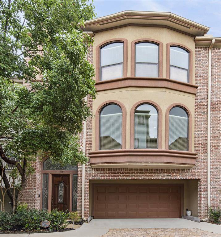 Welcome to 1825 Stanford St. This three story mostly brick townhome is tucked towards back of enclave for extra privacy and peace.
