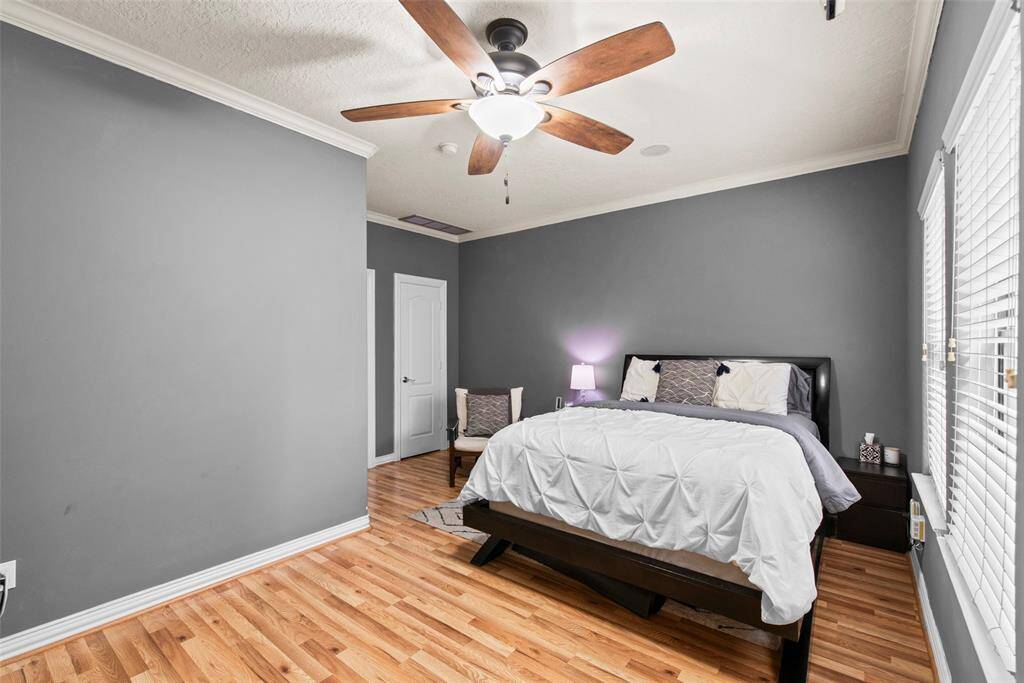 Bright and lovely guest room or first floor office with a large storage closet and en suite bathroom.