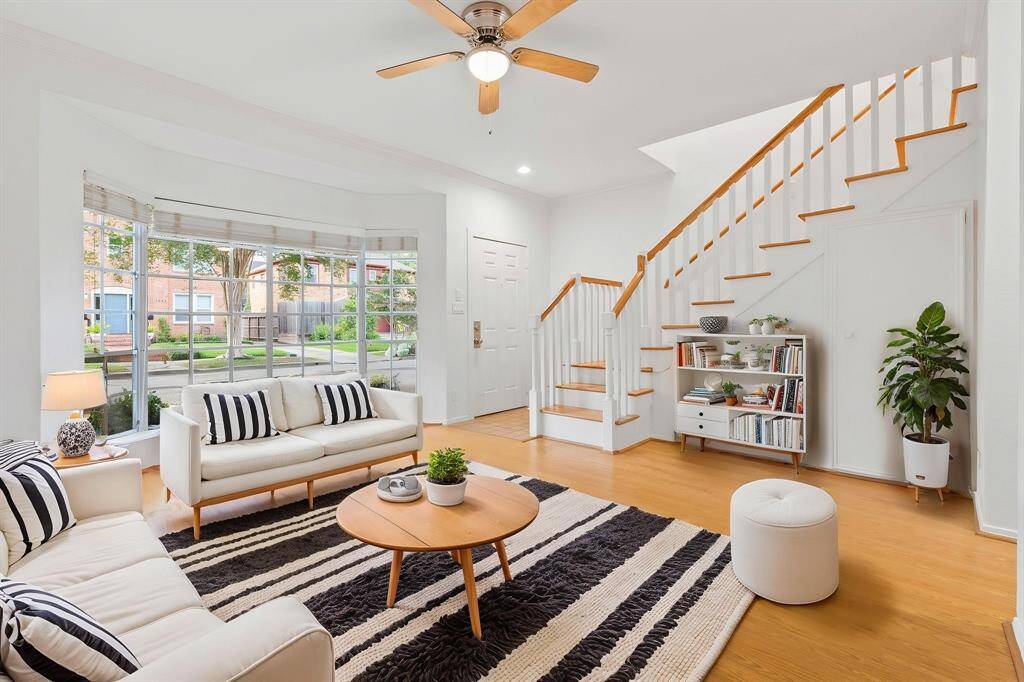 Sun drenched living room with Bay Windows overlooking Marshall St