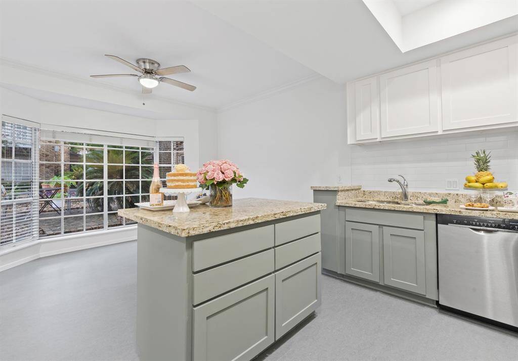 Another view of kitchen. Stainless steel Bosch dishwasher.