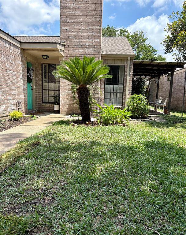 Another view from the fenced in front yard of this charming house!