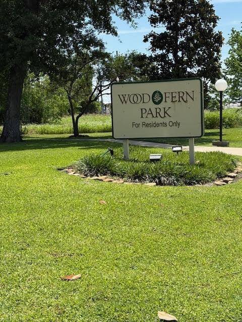 Wood Fern Community Park and Pool area with tables for a picnic.