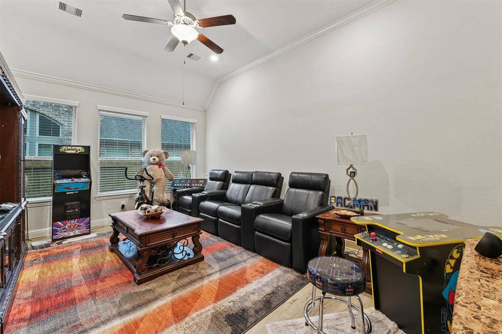 Flex room off the kitchen can be used as a game room, media room, or a second office