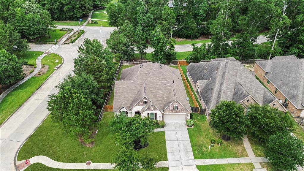 Great corner lot with no rear neighbors. Short walk to the pocket park behind the trees.