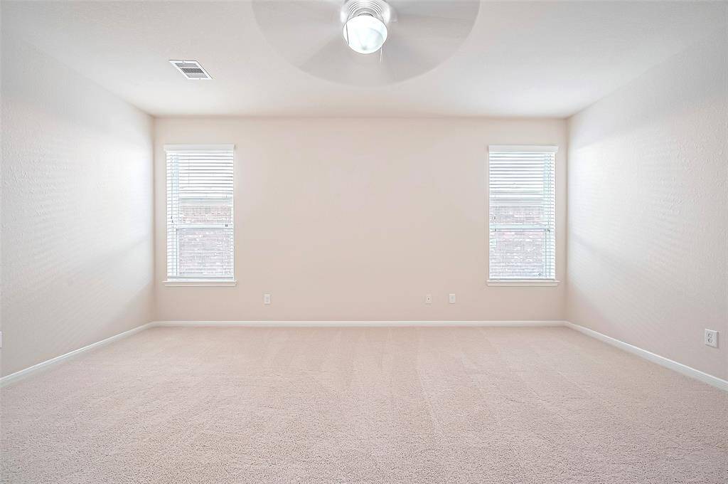 Thoughtfully designed to accommodate a king-sized bed while still offering ample space for additional furnishings