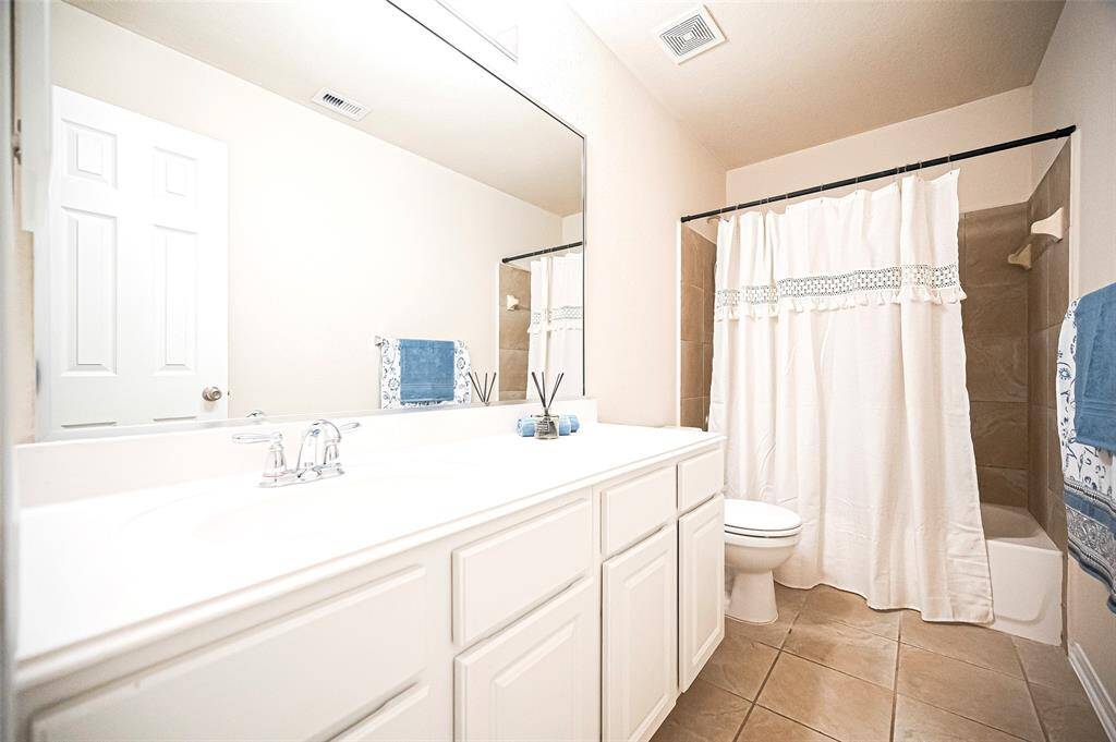 Shared bathroom conveniently positioned between bedroom 1 and 2