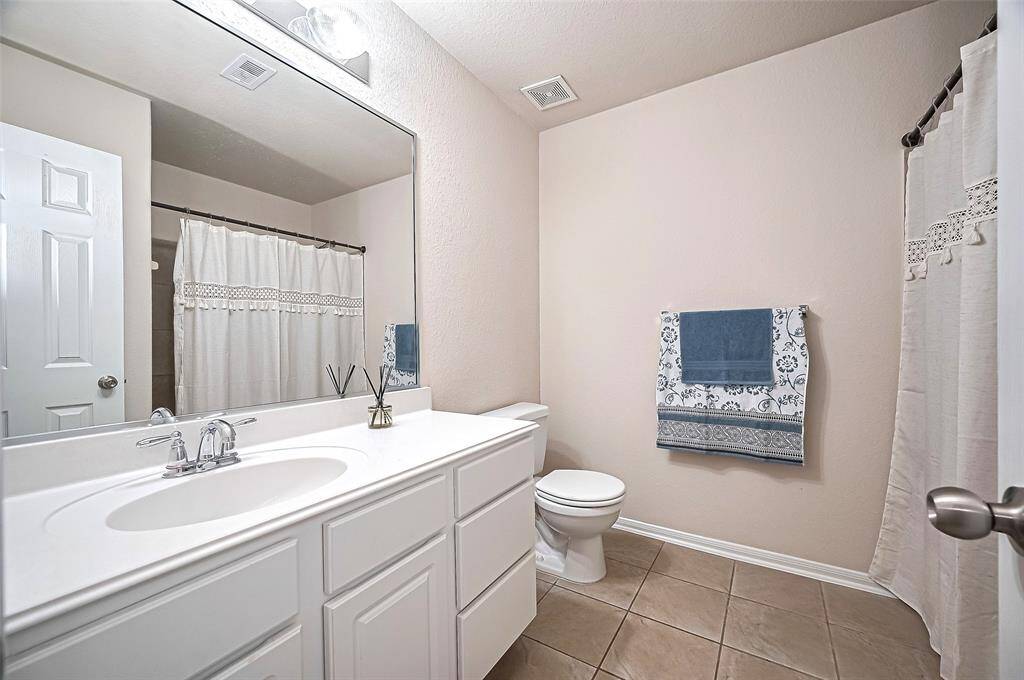 Shared Bathroom positioned between Bedroom 3 and 4
