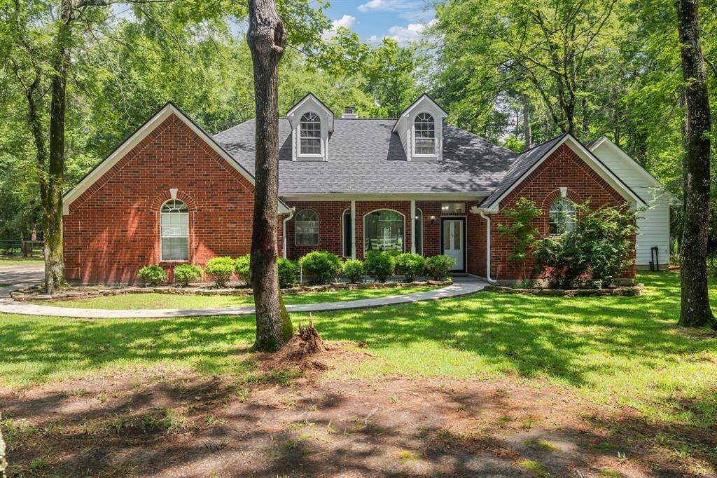 Discover your dream home at 19 Timber Lane, nestled in the scenic Lake Creek Forest.
