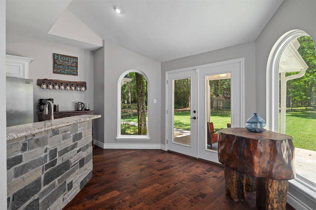 Stone accented breakfast bar & breakfast room.  Perfect for enjoying natural light and outdoor views.