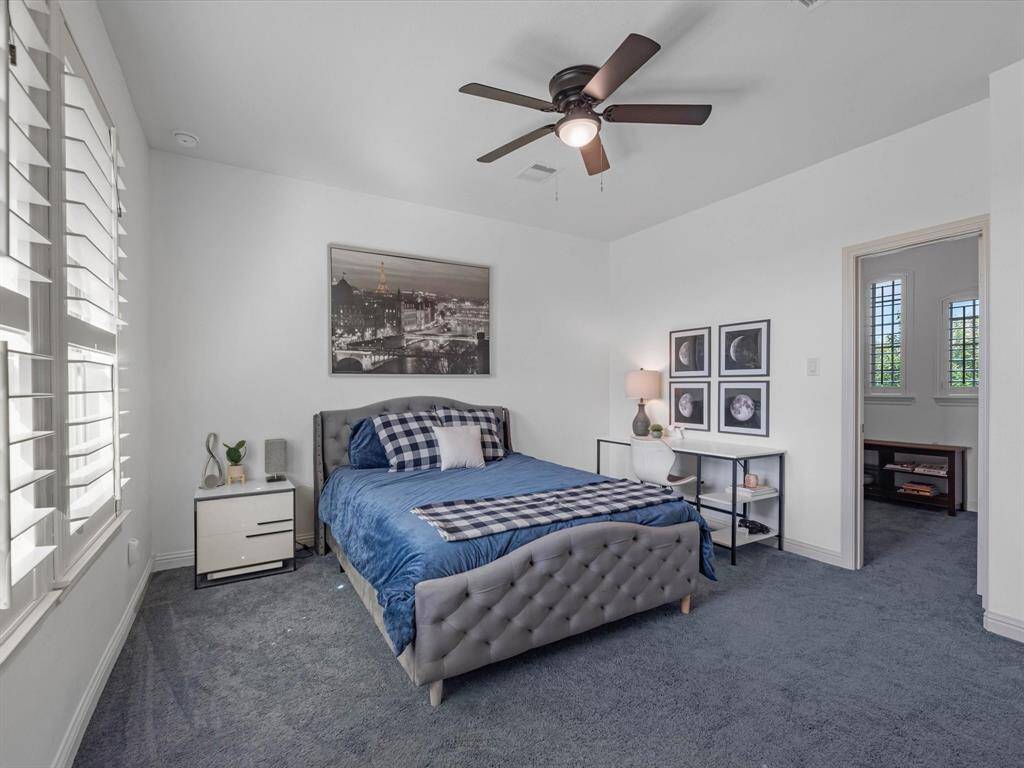 Secondary bedroom with walk in closet and ensuite bathroom.
