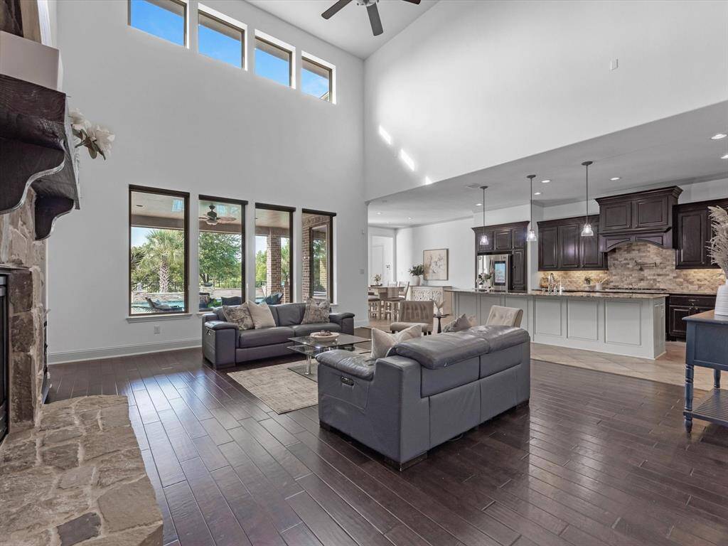 Sunlit family room with high ceilings