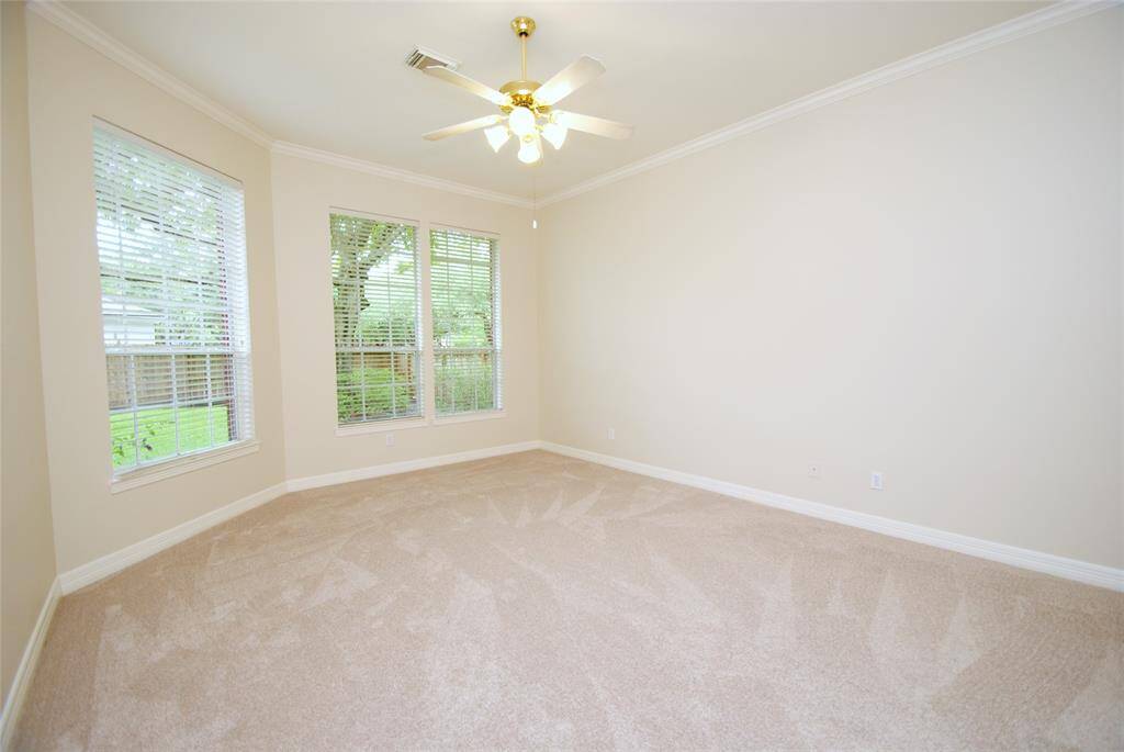 You will love waking up to all the greenery in the back and it is such a light and airy room.