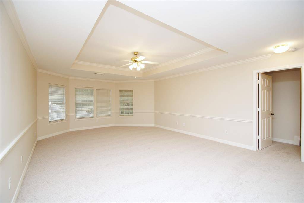 Gameroom with coffered ceilings