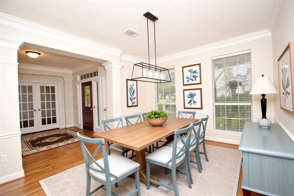 The dining room is off the entry way and has an updated light fixture and is ready for your dinner parties or family gatherings!  *room has been virtually staged*