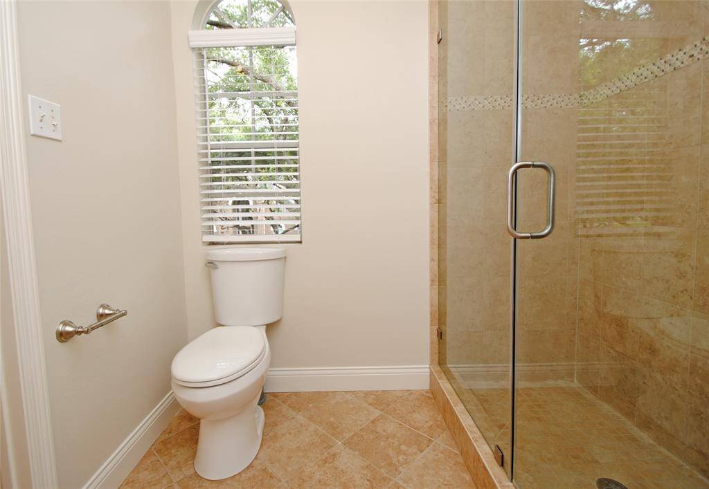 Secondary bathroom has been updated with a walk in shower