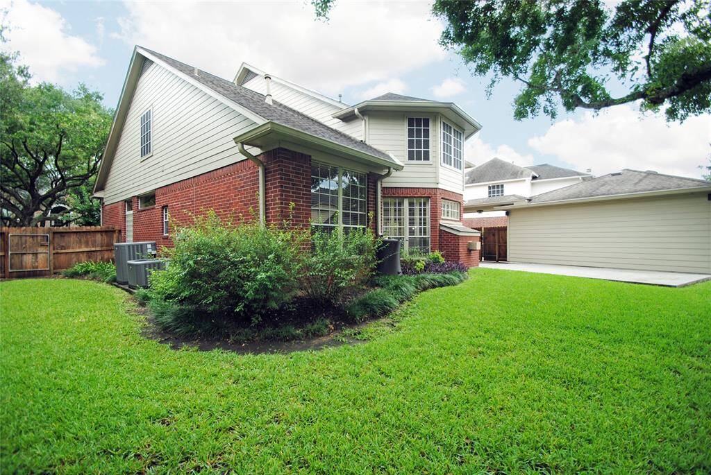 The back of the house showcasing the side yard.