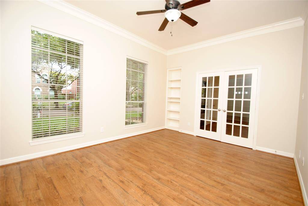 Another view of the study showcasing the french doors.